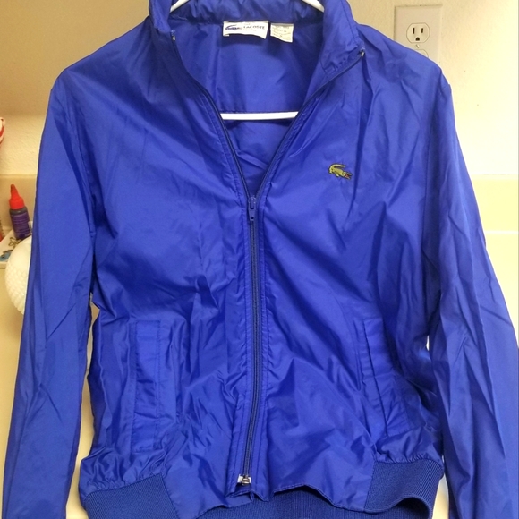 The Lacoste Blue Small WPL 1100 Jacket. - Picture 1 of 4